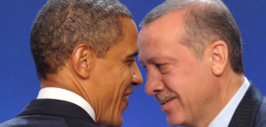 U.S. President Obama and Turkey's Prime Minister Erdogan take part in a family photo during the G20 Summit in Cannes