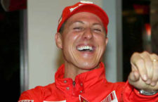 In this photo released by the Wroom2008 photo service, seven time World Champion Michael Schumacher smiles as he meets the media at the team's winter retreat in the Dolomites resort of Madonna Di Campiglio, northern Italy, Friday, Jan. 11, 2008. (AP Photo/Wrooom2008 Photo Service)